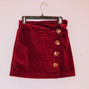 RED SKIRT W/ BUTTONS **WORN FOR MAYBE 30 MINS**